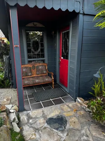 a view of a backyard of house with lots of green space