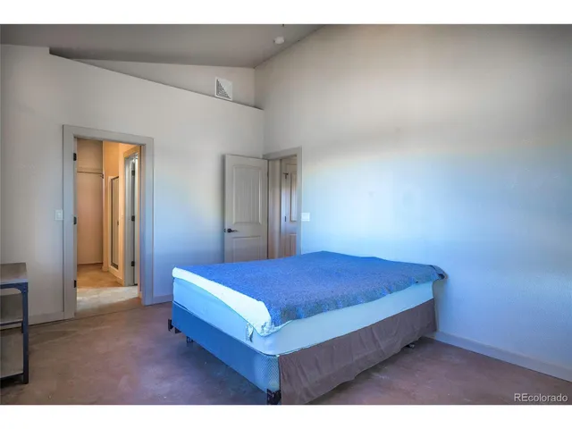 a living room with a bed