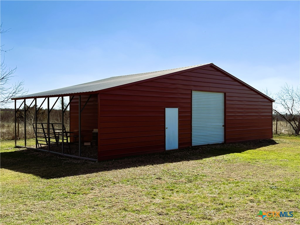 936 County Road 109 Riesel, TX 76682 - Photo 15 of 22 a view of wooden house with a yard