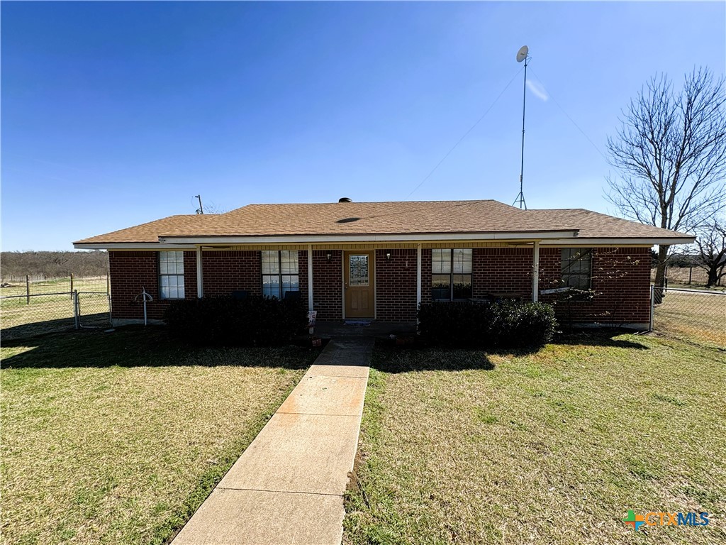 936 County Road 109 Riesel, TX 76682 - Photo 2 of 22 a front view of a house with a yard