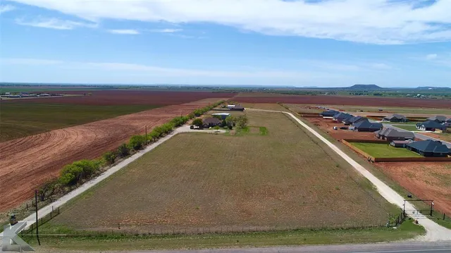 a view of a swimming pool with an ocean view