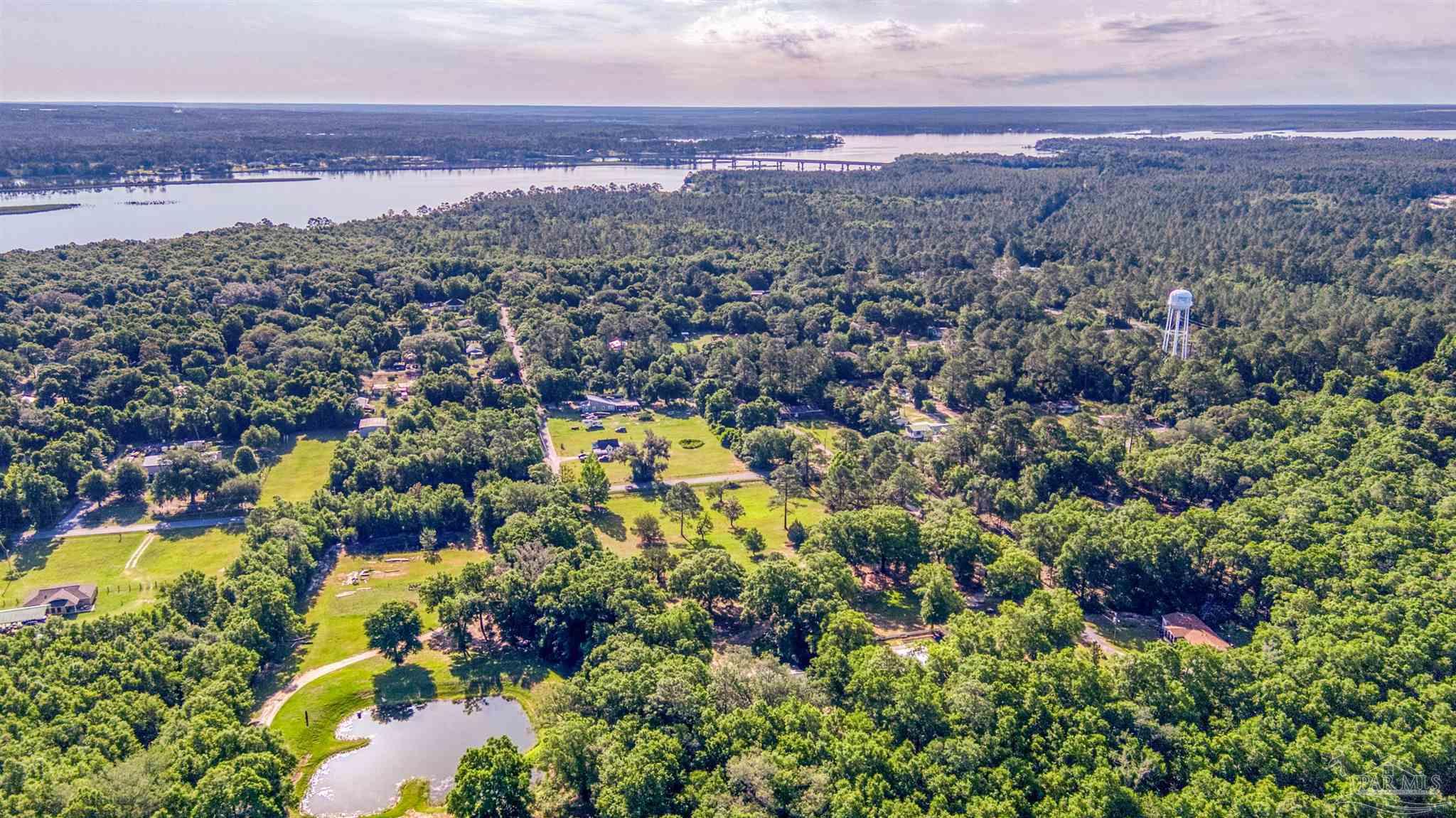 0 Morrison Road Milton, FL 32583 - Photo 14 of 21 a view of a city with mountains in the background