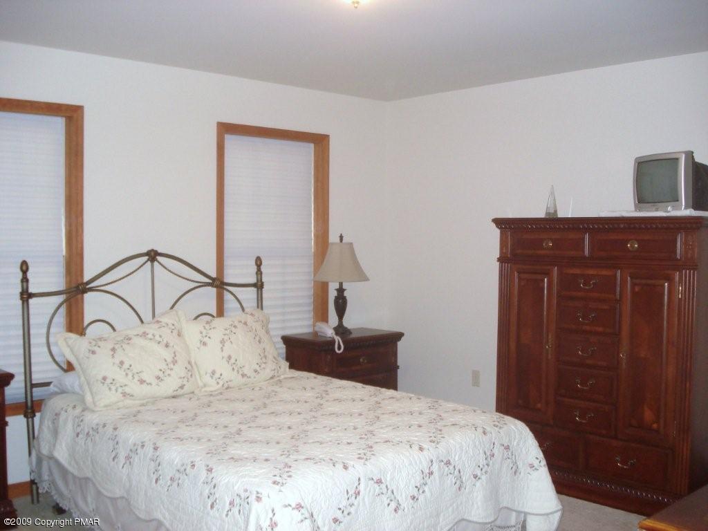 51 Whittaker Road Dingmans Ferry, PA 18328 - Photo 12 of 17 masterbed room