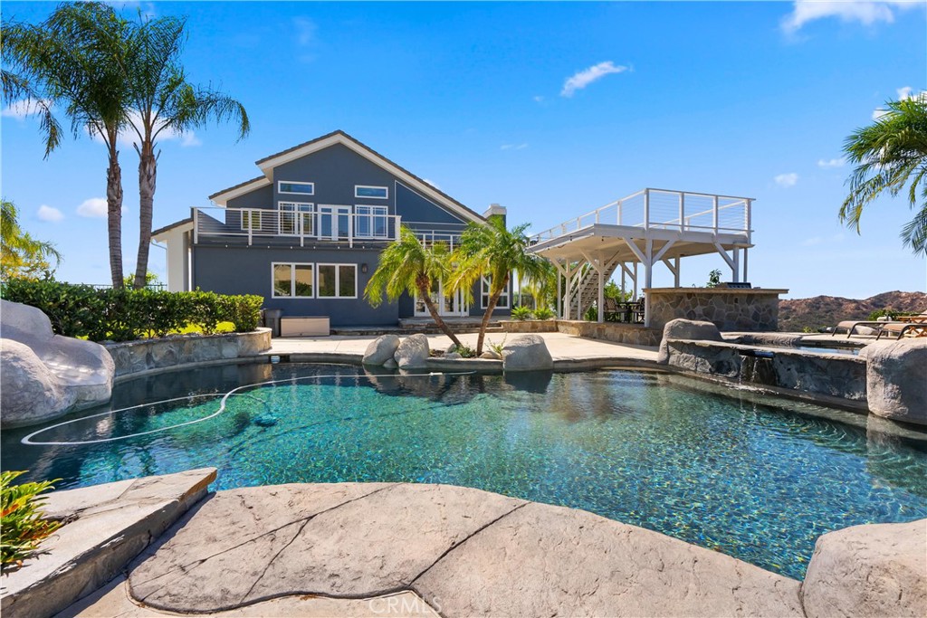 3 Windy Ridge Road Trabuco Canyon, CA 92679 - Photo 11 of 59 a front view of a house with garden