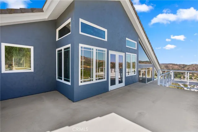 a kitchen with stainless steel appliances granite countertop wooden cabinets a stove top oven a sink and dishwasher