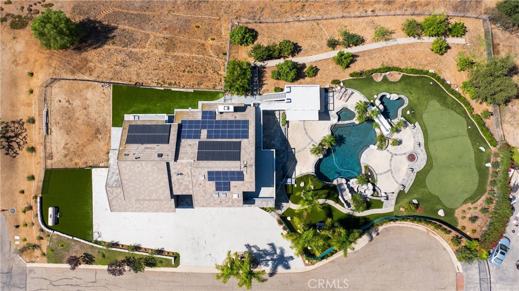 3 Windy Ridge Road Trabuco Canyon, CA 92679 - Photo 3 of 59 an aerial view of a house with a swimming pool