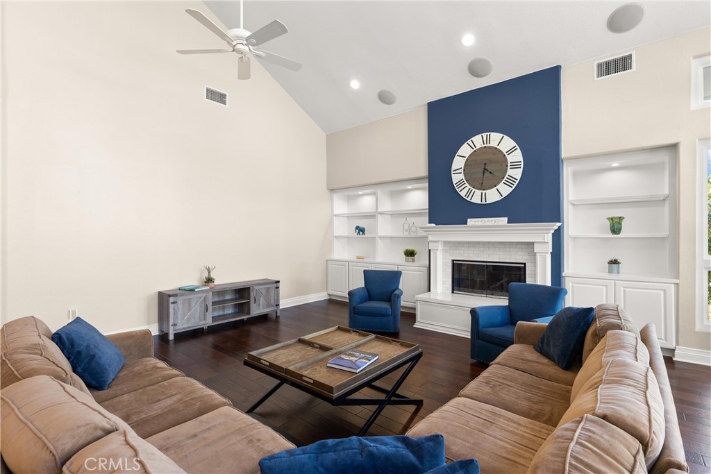 3 Windy Ridge Road Trabuco Canyon, CA 92679 - Photo 31 of 59 a living room with furniture and a fireplace