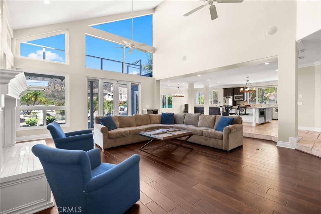 3 Windy Ridge Road Trabuco Canyon, CA 92679 - Photo 33 of 59 a living room with furniture wooden floor and a large window