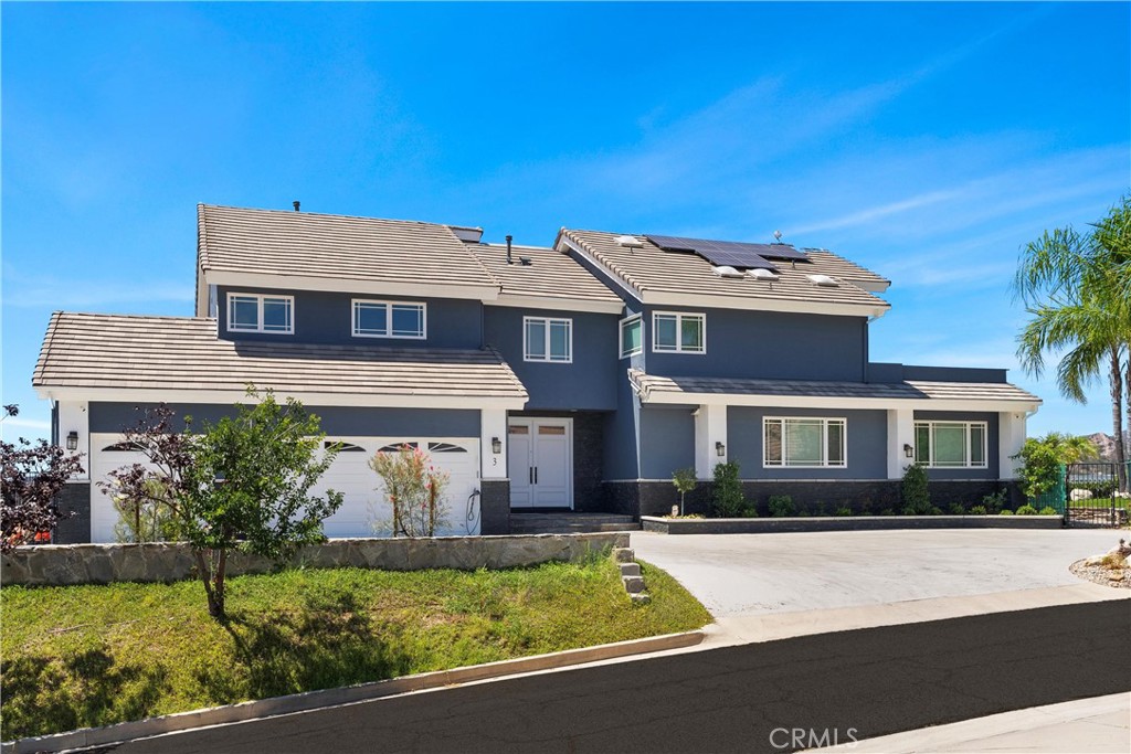 3 Windy Ridge Road Trabuco Canyon, CA 92679 - Photo 4 of 59 front view of a house with a yard