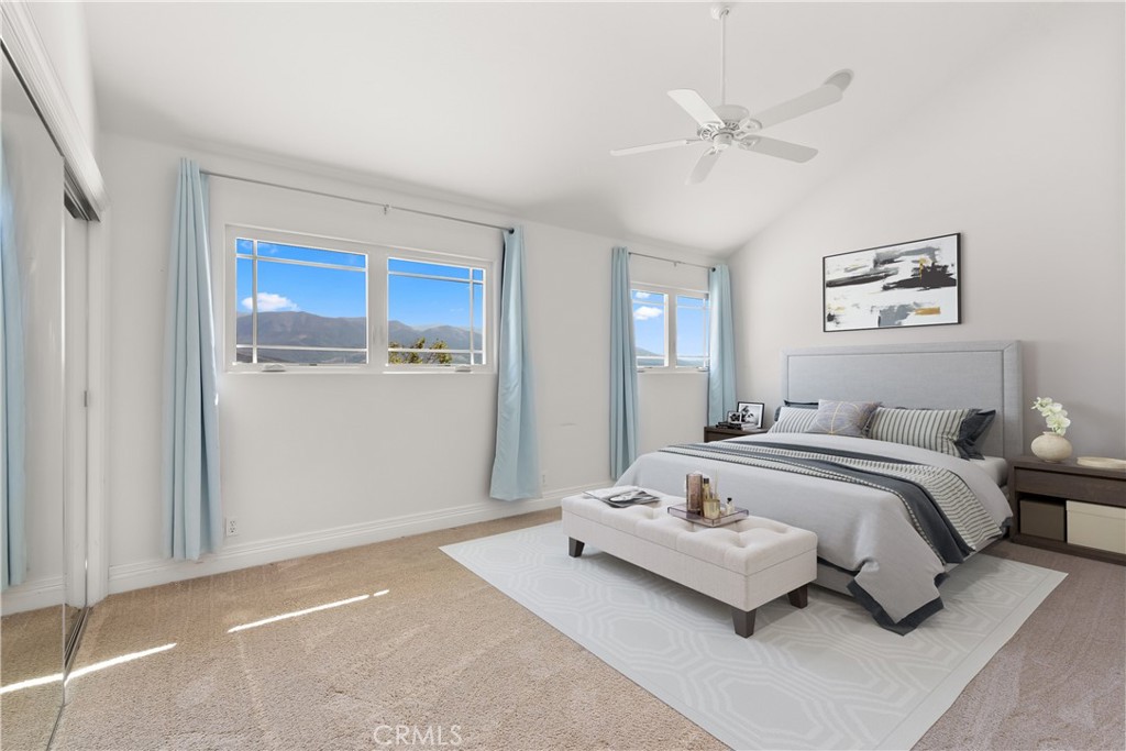 3 Windy Ridge Road Trabuco Canyon, CA 92679 - Photo 44 of 59 a spacious bedroom with a bed and ceiling fan