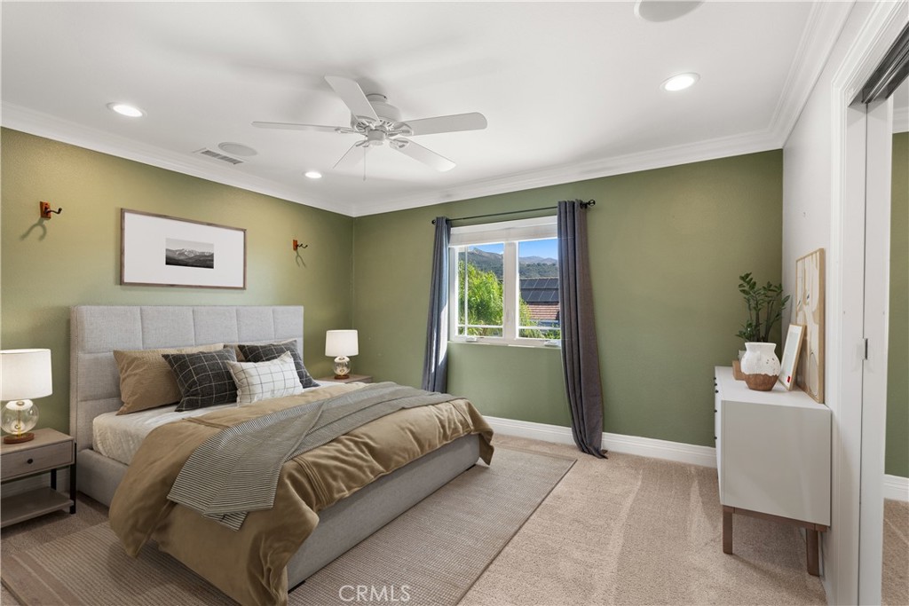 3 Windy Ridge Road Trabuco Canyon, CA 92679 - Photo 46 of 59 a bedroom with a bed and a couch