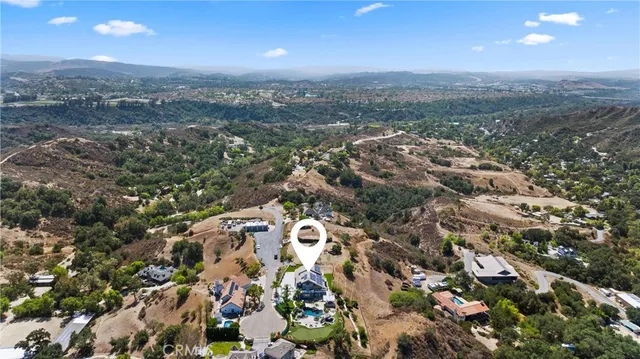 an aerial view of residential house with outdoor space