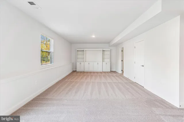 a view of a room with an empty space