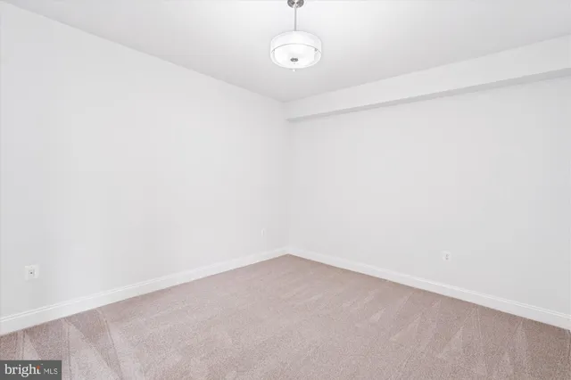 a view of house with backyard