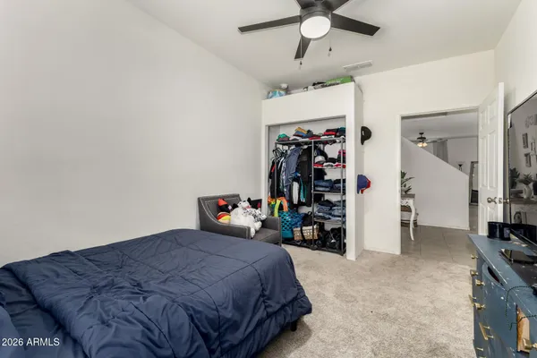 a room with furniture and chandelier