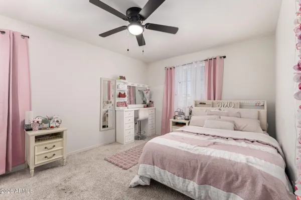 a spacious bathroom with a tub and shower