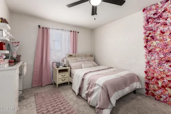a view of a room with a kitchen