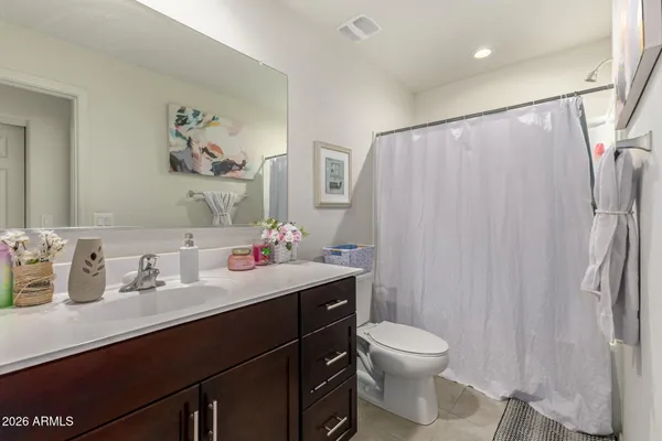 a view of a house with a backyard and kitchen