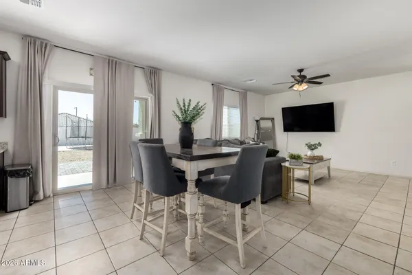 a kitchen with granite countertop stainless steel appliances and a counter space