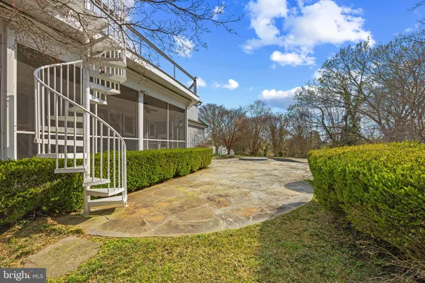 an aerial view of residential house with outdoor space