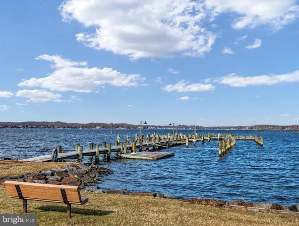 an aerial view of a house with a lake view