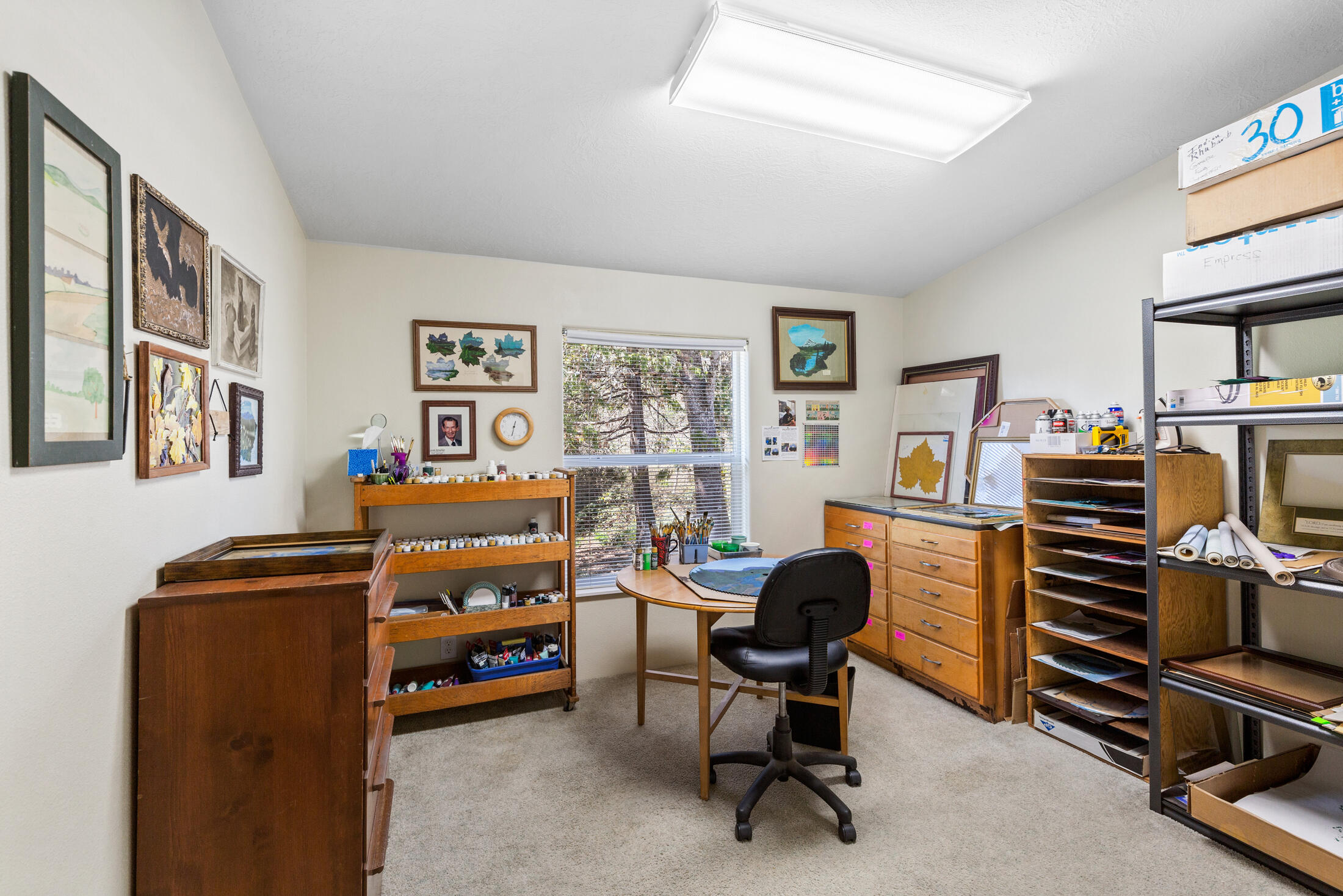 4550 Holland Loop Road Cave Junction, OR 97523 - Photo 15 of 39 a view of a workspace with furniture and a workspace