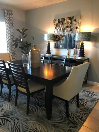 a living room with chairs