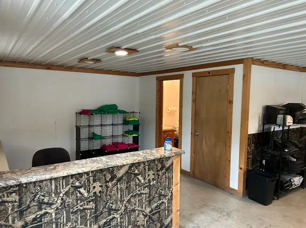 a living room with furniture and window