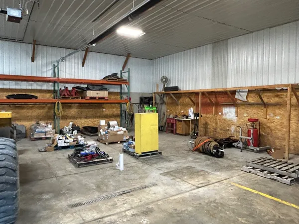 a view of parking garage with cars