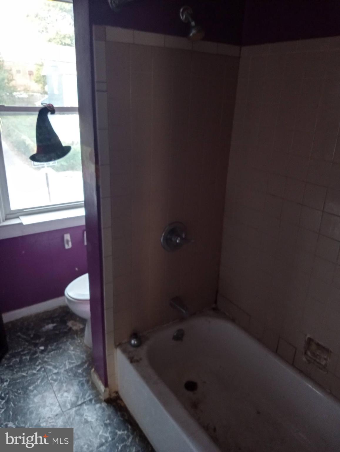 4417 Old York Road Baltimore, MD 21212 - Photo 3 of 6 a bathroom with a sink and a toilet