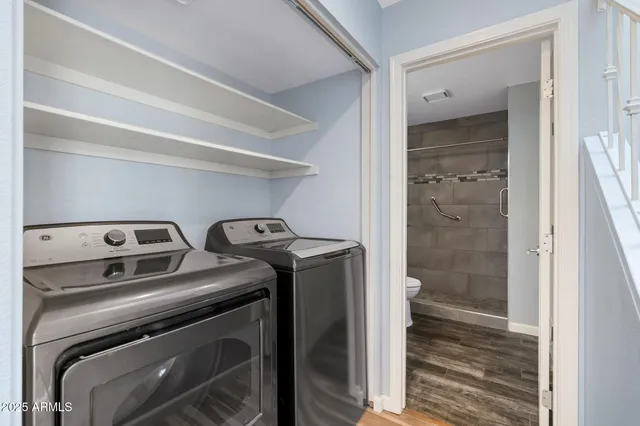 a utility room with dryer and washer