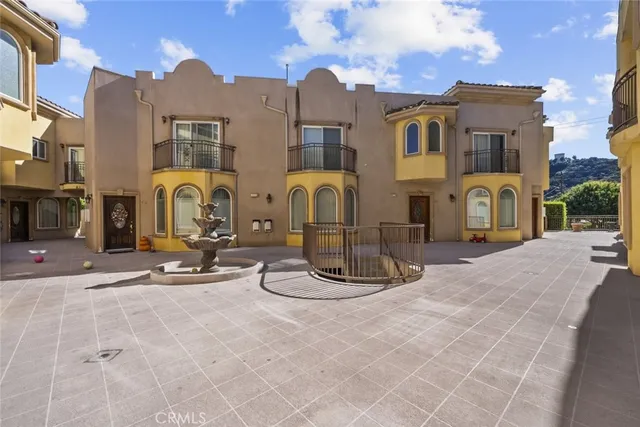 a front view of a building with glass windows