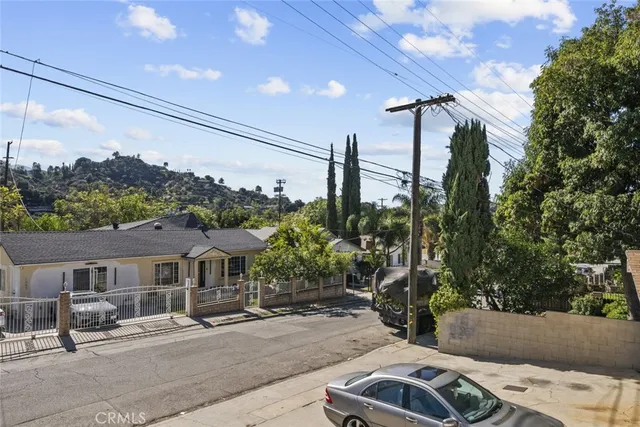 a view of a hallway with washer and dryer