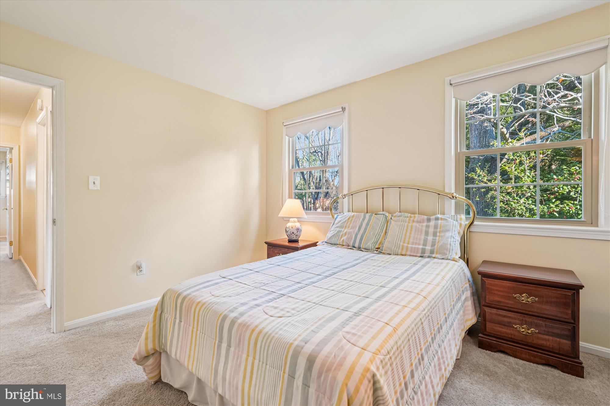 15417 Aylesbury Street Silver Spring, MD 20905 - Photo 24 of 65 a bedroom with a bed and a window