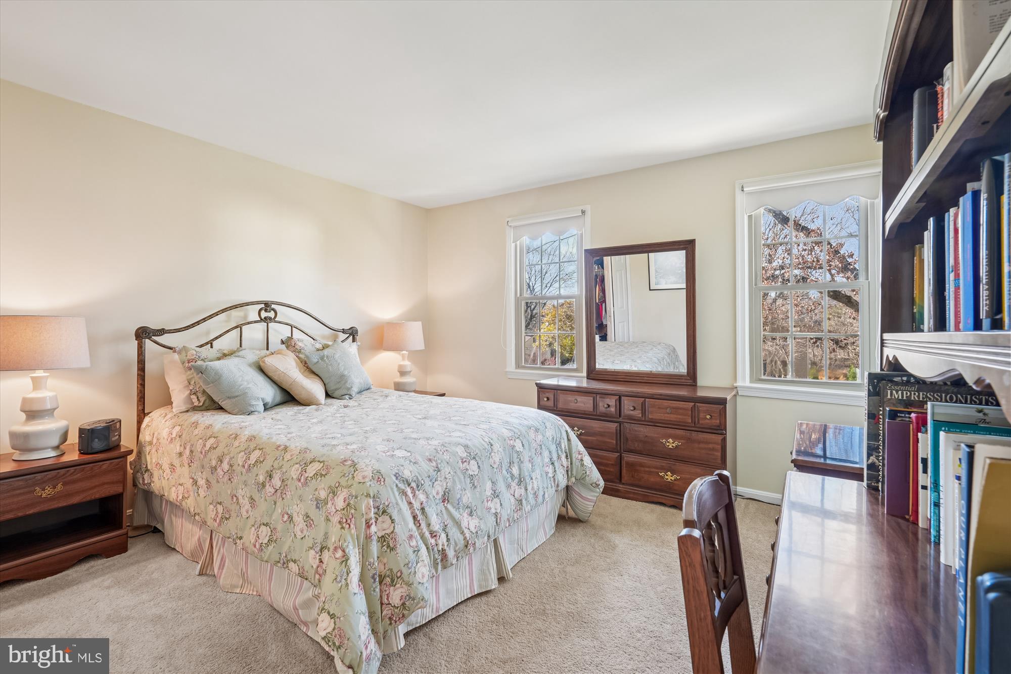 15417 Aylesbury Street Silver Spring, MD 20905 - Photo 25 of 65 a bedroom with bed and window