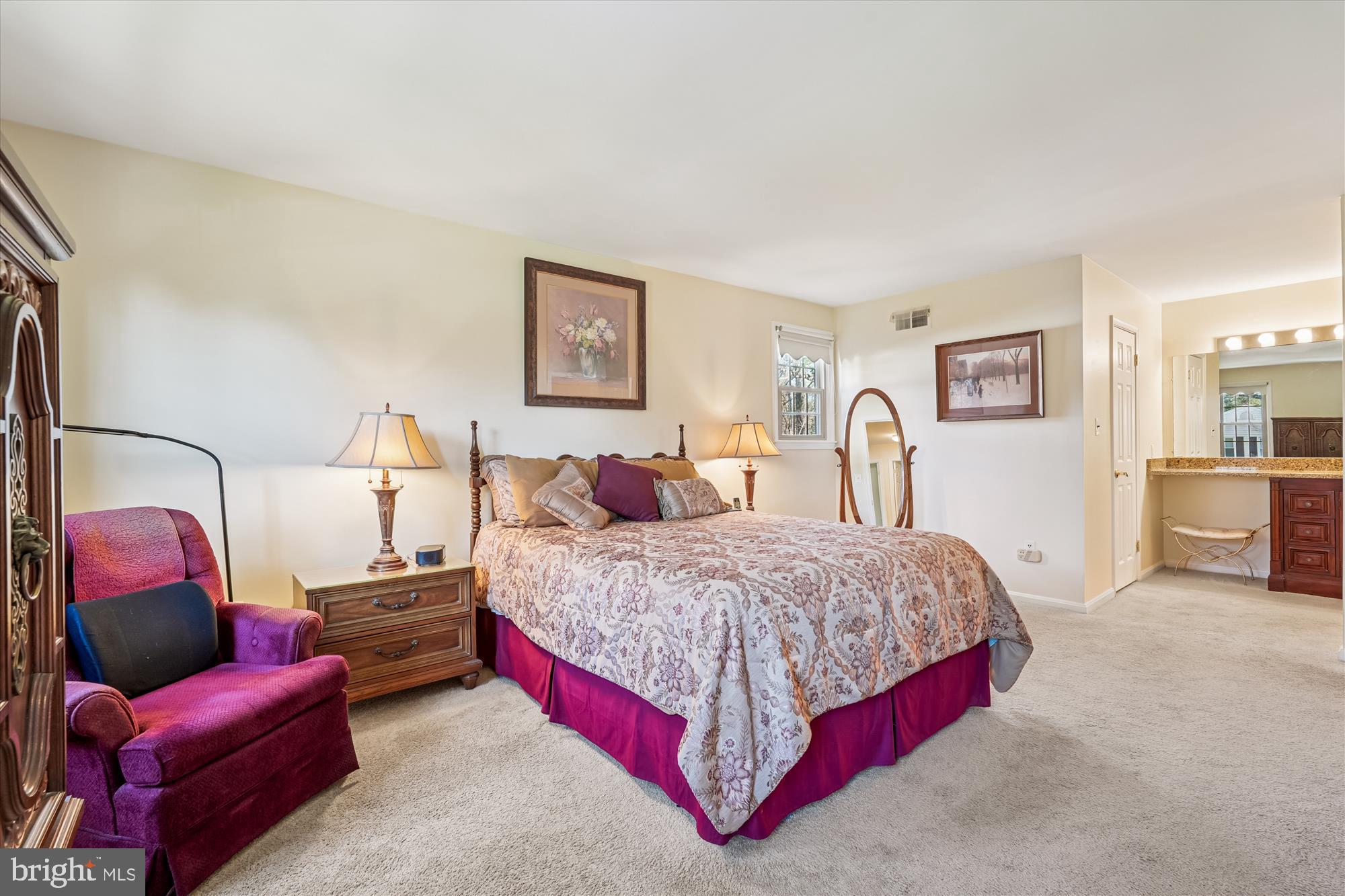 15417 Aylesbury Street Silver Spring, MD 20905 - Photo 33 of 65 a bedroom with bed and a couch