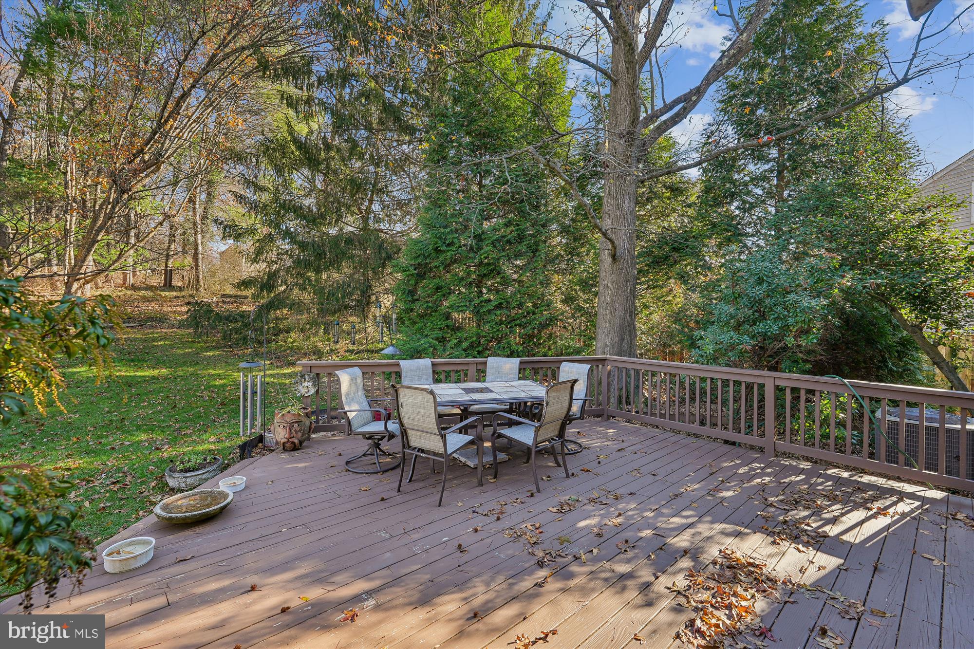 15417 Aylesbury Street Silver Spring, MD 20905 - Photo 41 of 65 a view of a table and chairs on the roof deck