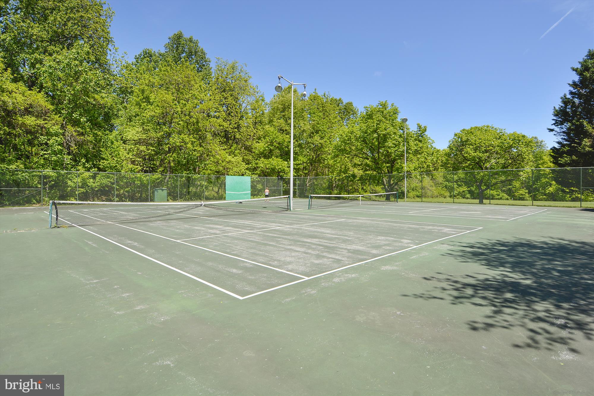 15417 Aylesbury Street Silver Spring, MD 20905 - Photo 57 of 65 a view of a tennis court