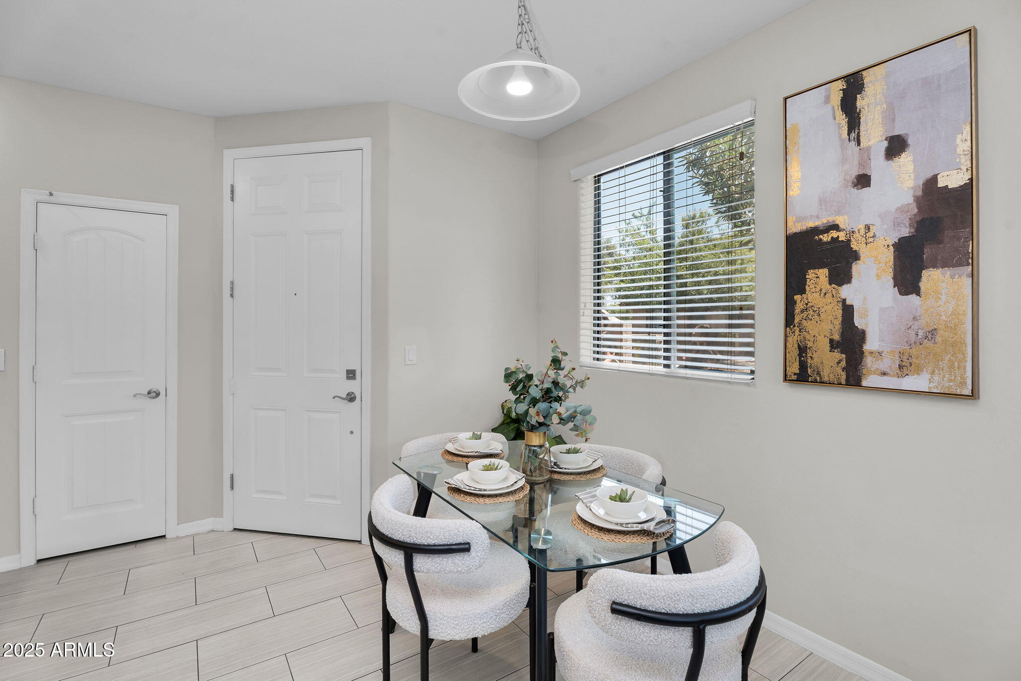 3330 South Gilbert Road, Unit 1075 Chandler, AZ 85286 - Photo 17 of 70 a dining room with furniture and window