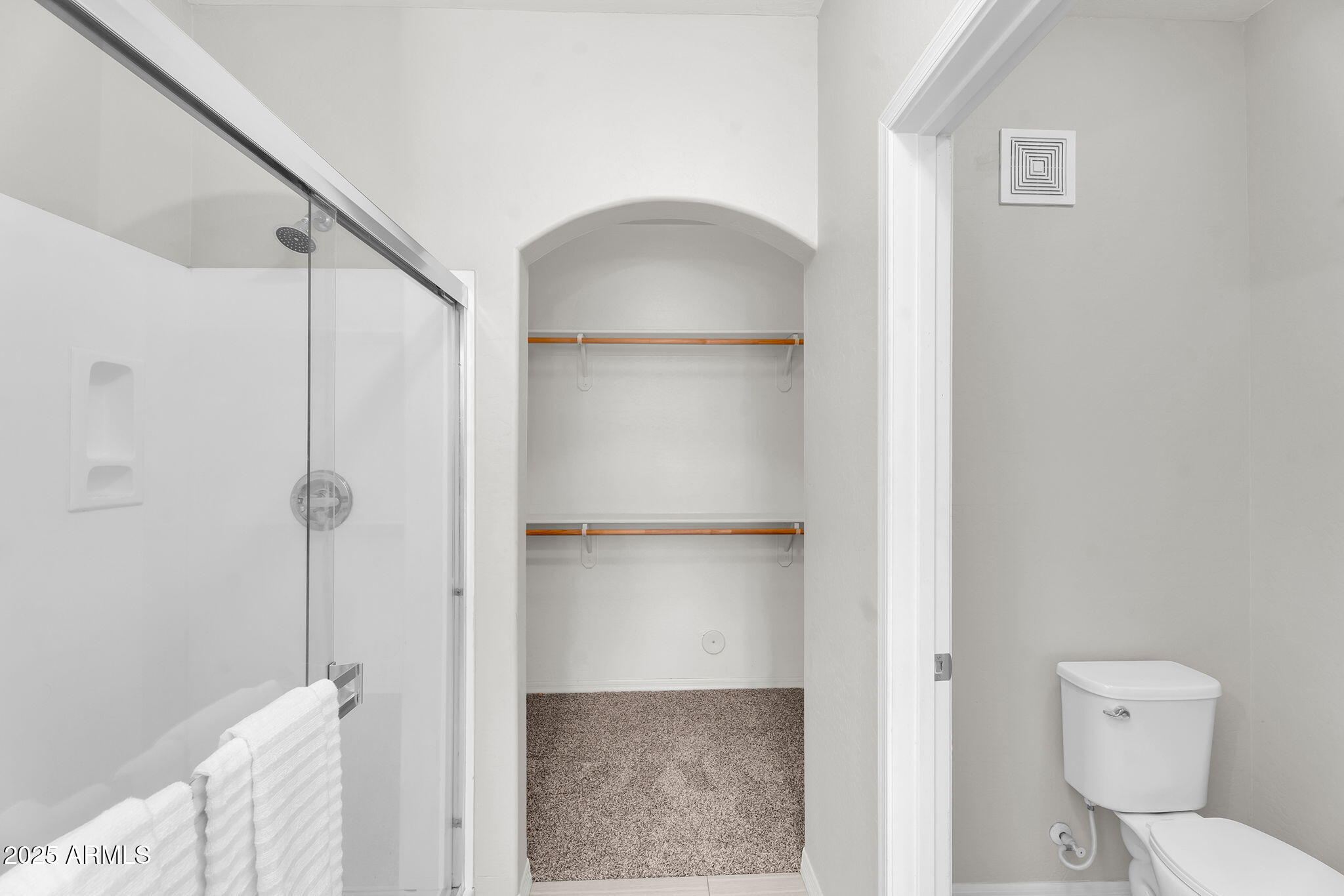 3330 South Gilbert Road, Unit 1075 Chandler, AZ 85286 - Photo 29 of 70 a bathroom with a shower and a toilet