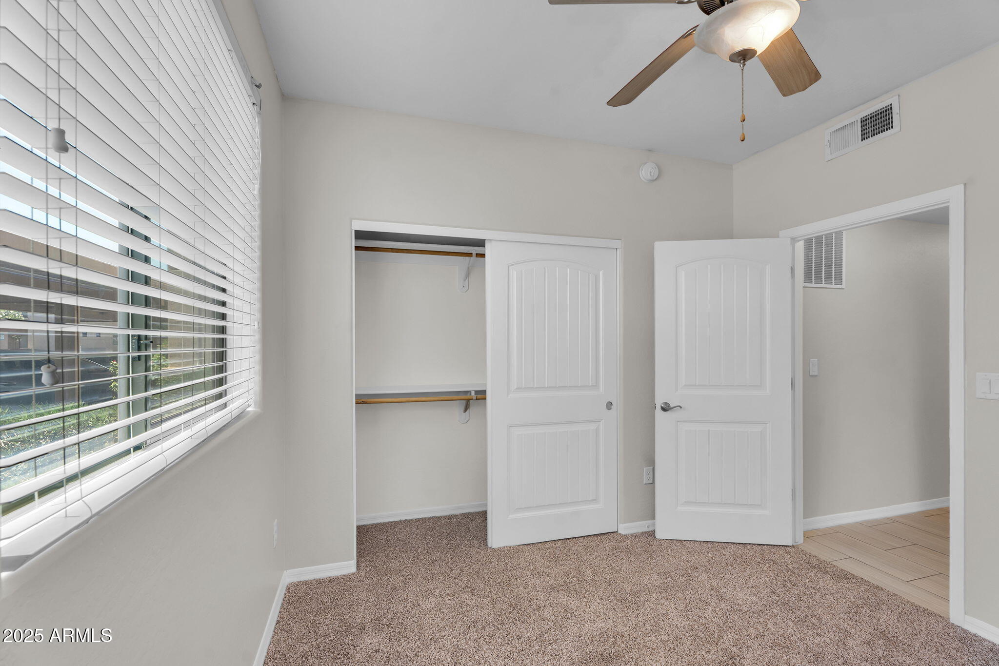 3330 South Gilbert Road, Unit 1075 Chandler, AZ 85286 - Photo 31 of 70 a view of an empty room with a window