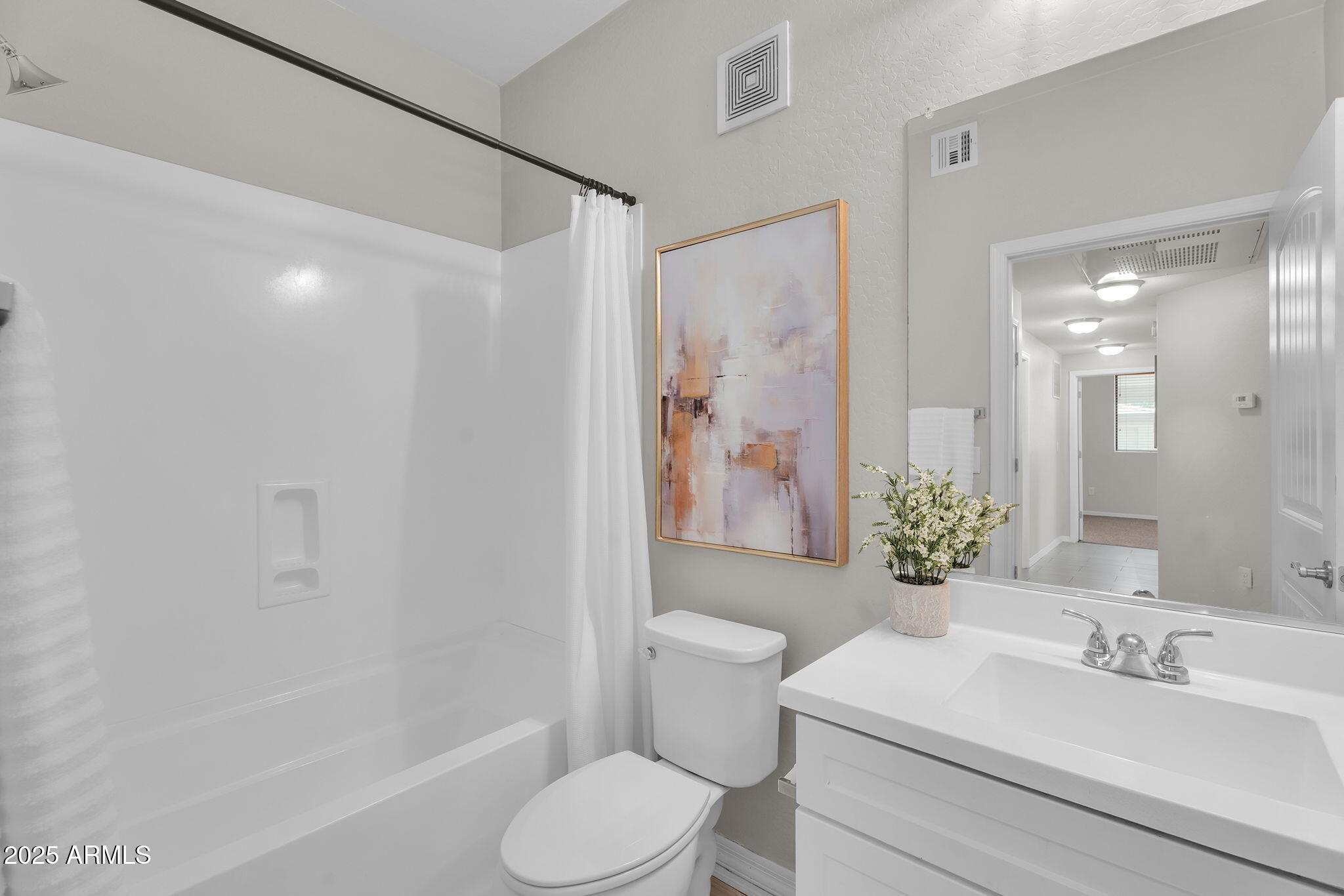 3330 South Gilbert Road, Unit 1075 Chandler, AZ 85286 - Photo 37 of 70 a bathroom with a sink toilet and shower