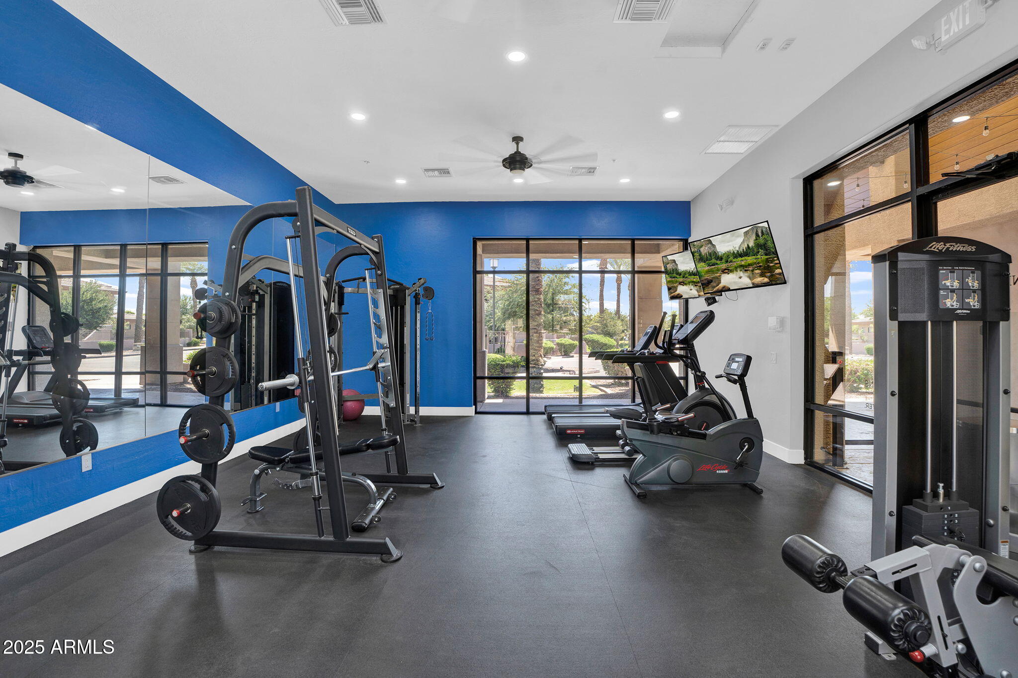 3330 South Gilbert Road, Unit 1075 Chandler, AZ 85286 - Photo 58 of 70 a view of a room with gym equipment