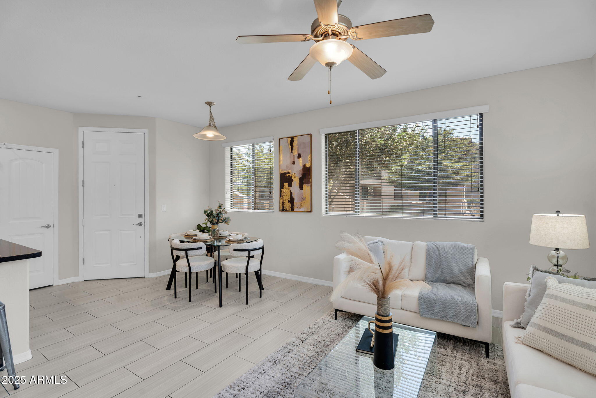 3330 South Gilbert Road, Unit 1075 Chandler, AZ 85286 - Photo 5 of 70 a living room with furniture and a large window