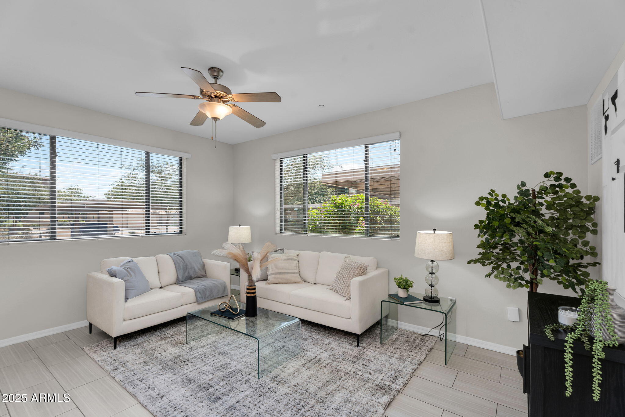 3330 South Gilbert Road, Unit 1075 Chandler, AZ 85286 - Photo 6 of 70 a living room with furniture and a large window