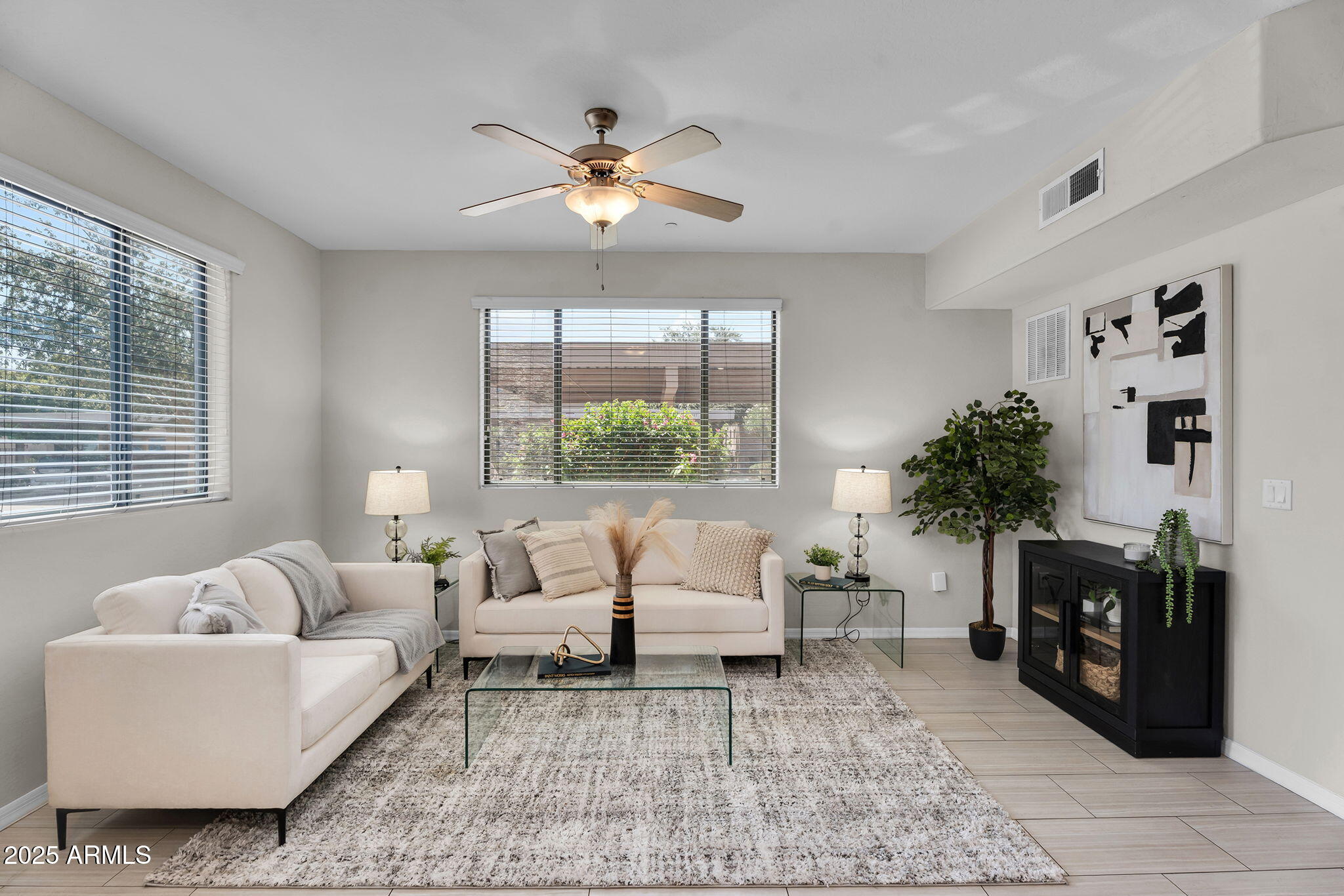 3330 South Gilbert Road, Unit 1075 Chandler, AZ 85286 - Photo 7 of 70 a living room with furniture and a large window