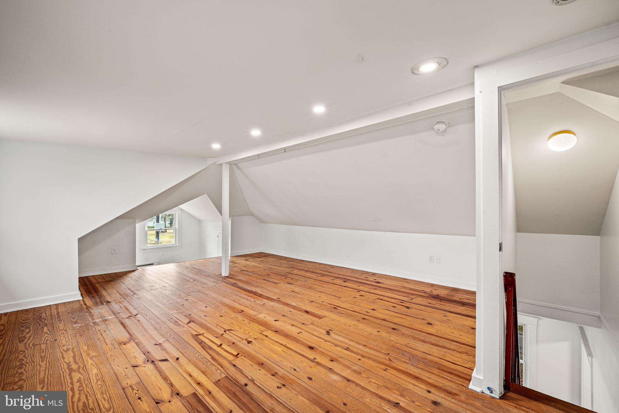 1026 Hares Hill Road Phoenixville, PA 19460 - Photo 19 of 27 a view of empty room with wooden floor