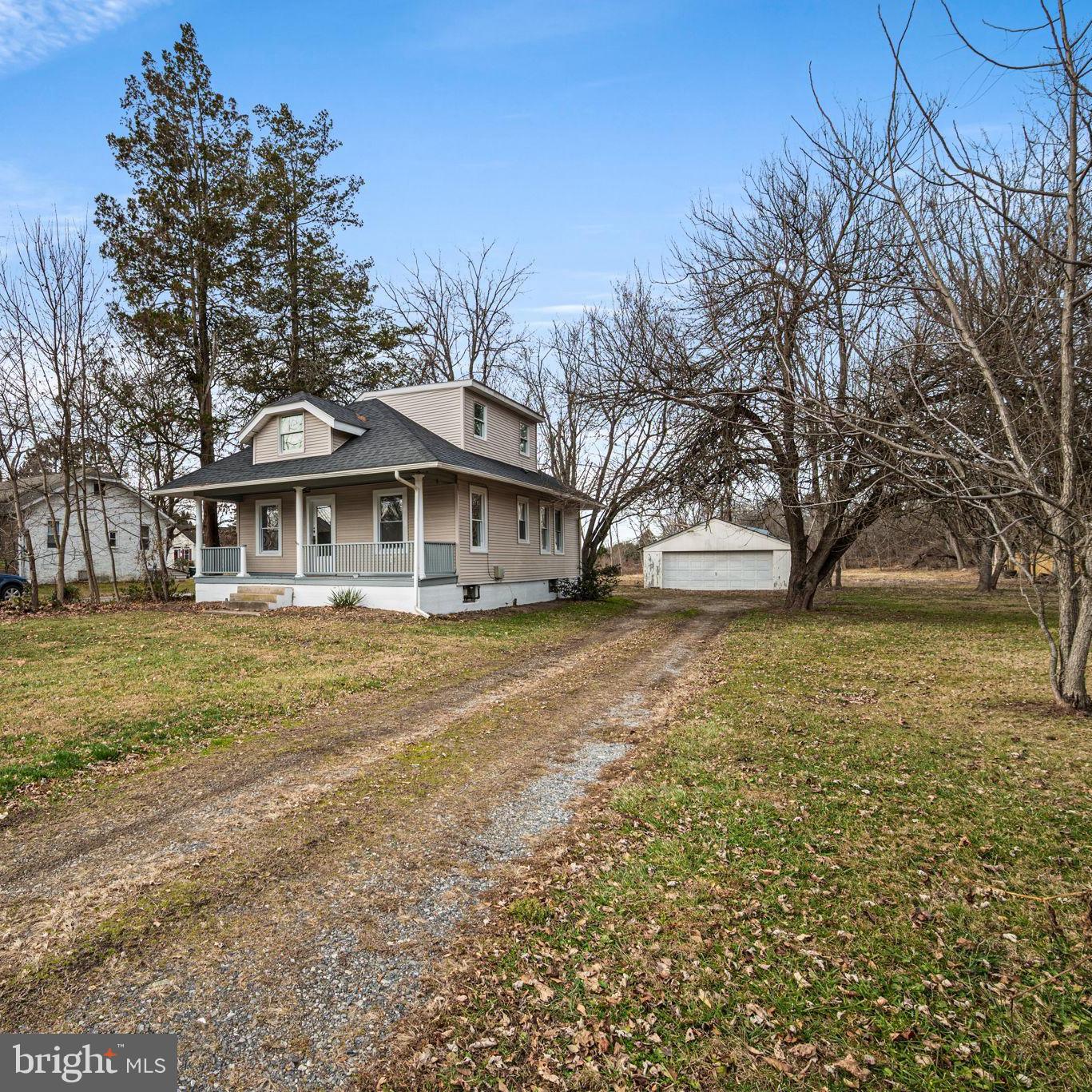 1026 Hares Hill Road Phoenixville, PA 19460 - Photo 4 of 27 a front view of a house with garden