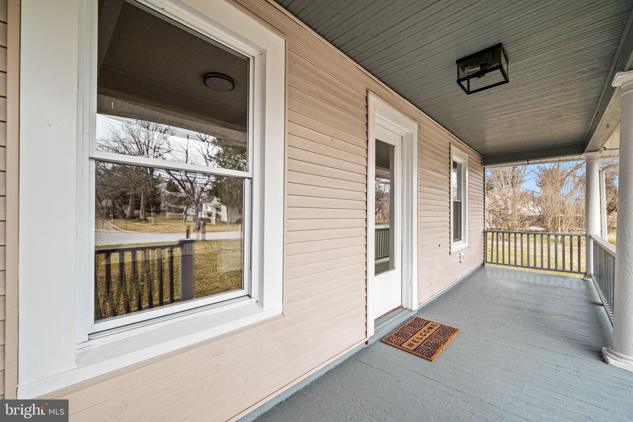 1026 Hares Hill Road Phoenixville, PA 19460 - Photo 5 of 27 a view of a balcony with a ceiling fan
