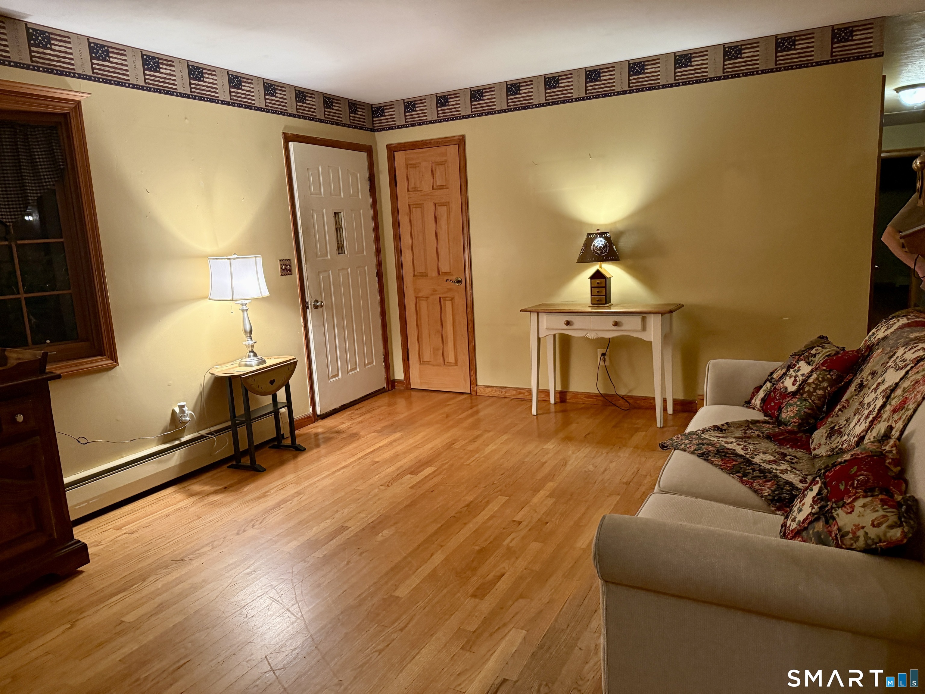 112 Maple Street Seymour, CT 06483 - Photo 4 of 34 Living room with great traffic flow into dining room and kitchen.
